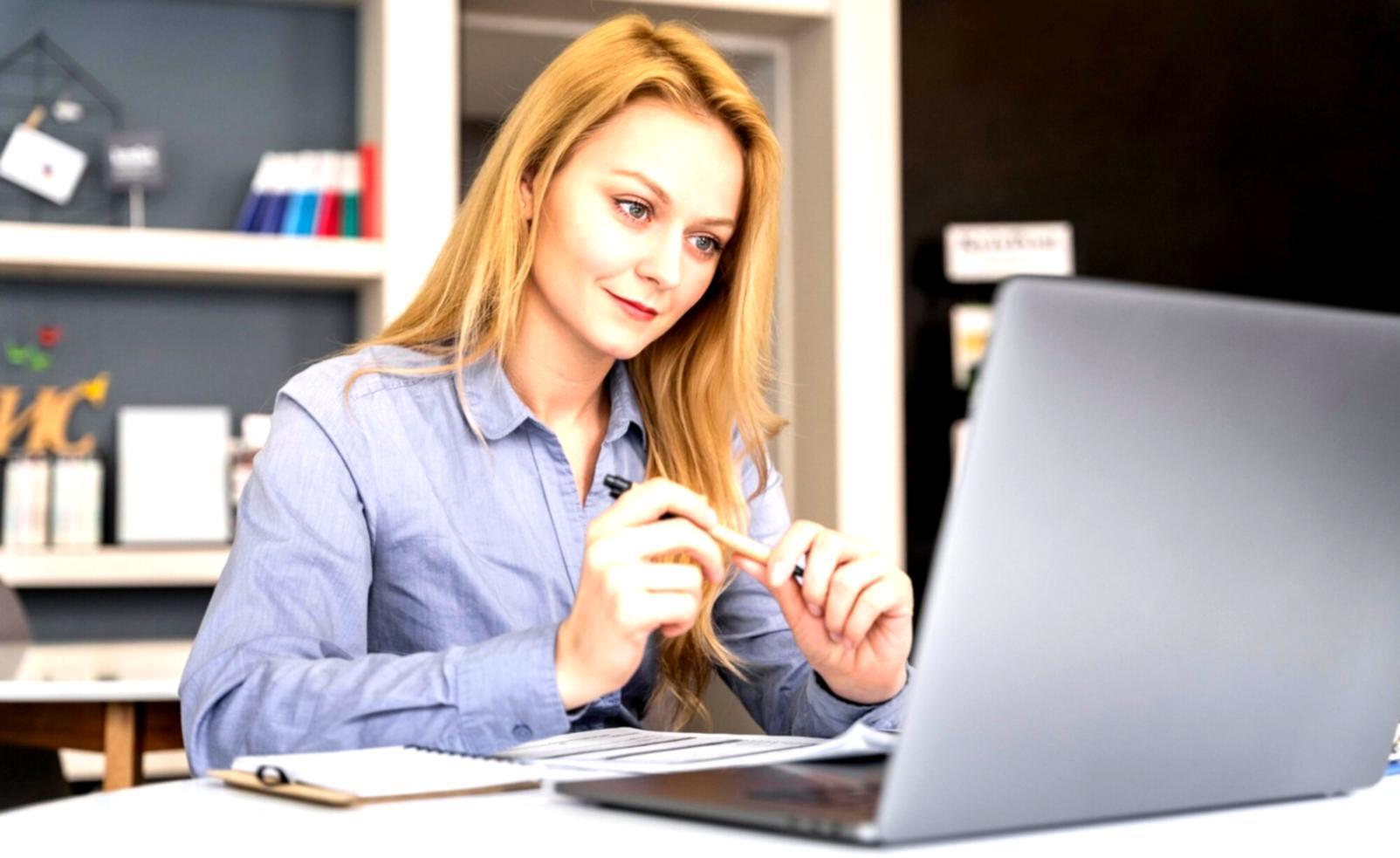Student analyzing financial data on computer screen
